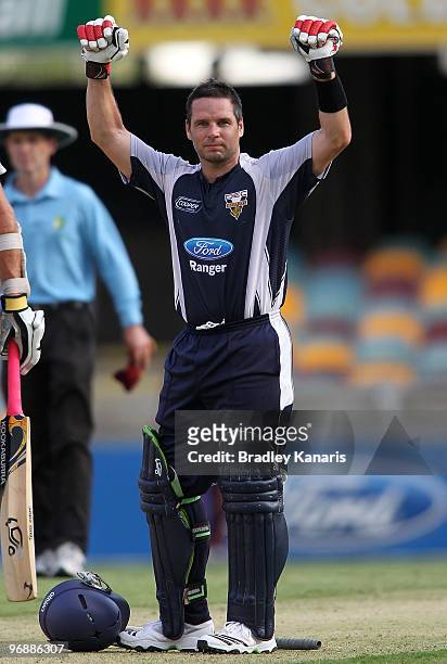 Brad Hodge of the Bushrangers celebrates after scoring a century during the Ford Ranger Cup match between the Queensland Bulls and the Victorian...
