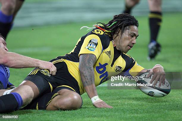 Ma'a Nonu of the Hurricanes scores a try during the round two Super 14 match between the Hurricanes and the Western Force at Westpac Stadium on...