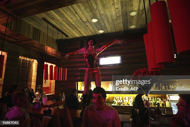 Performer dances in a lingerie outfit during Friday night evening at a nightclub in the Lebanese ski resort of Faqra, northeast of Beirut, in the...