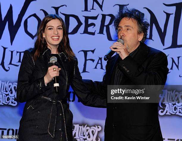 Actress Anne Hathaway and director Tim Burton appear onstage at Walt Disney Pictures & Buena Vista Records "Alice in Wonderland" Fan Event at...