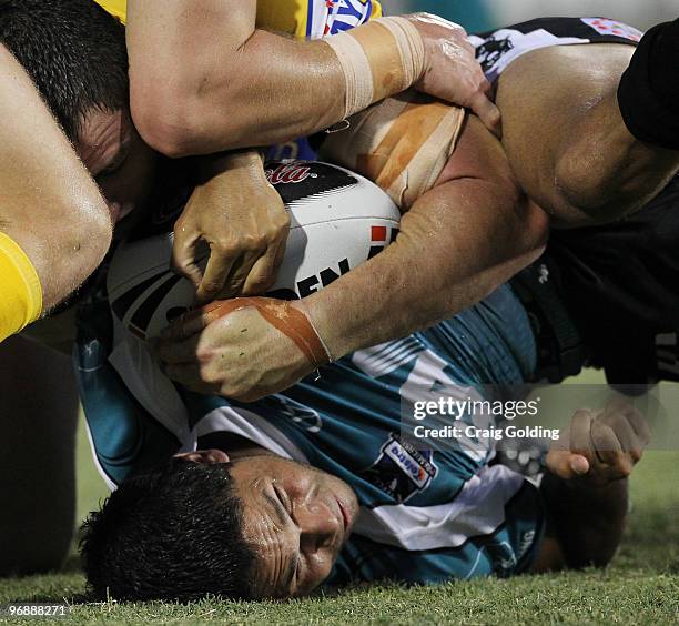 Brad Tighe of the Panthers is tackled during the NRL trial match between the Penrith Panthers and the Parramatta Eels at CUA Stadium on February 20,...