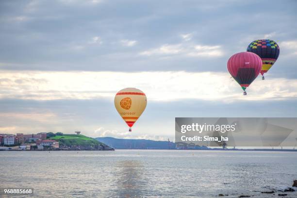 second regatta of balloons in gijon - sima ha stock pictures, royalty-free photos & images