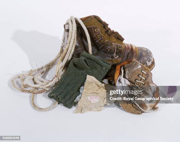 Items belonging to George Mallory - hobnail boot, fragments of second boot and climbing rope, single fingerless glove and cloth fragment with labels,...