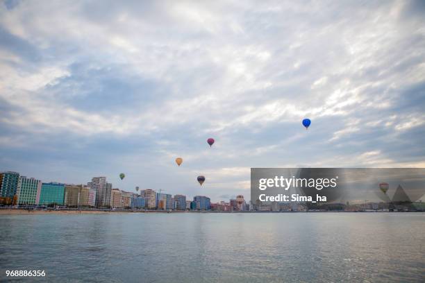 second regatta of balloons in gijon - sima ha stock pictures, royalty-free photos & images