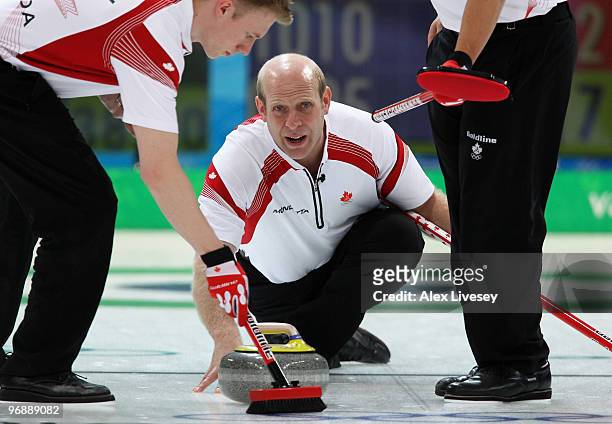 Kevin Martin of Canada releases a stone during the Men's Curling Round Robin match between Denmark and Canada on day 8 of the Vancouver 2010 Winter...