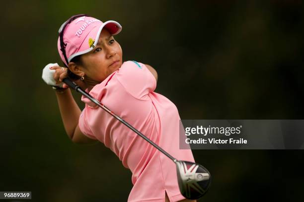 Ai Miyazato of Japan tees off on the 9th hole during round three of the Honda PTT LPGA Thailand at Siam Country Club on February 20, 2010 in Chon...