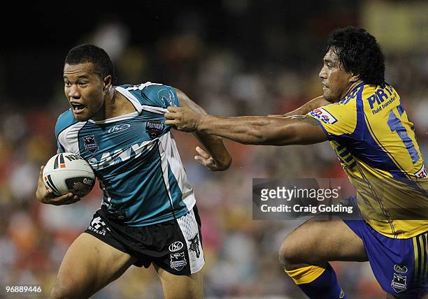 Joseph Paulo of the Panthers is tackled by Fuifui Moimoi of the Eels during the NRL trial match between the Penrith Panthers and the Parramatta Eels...