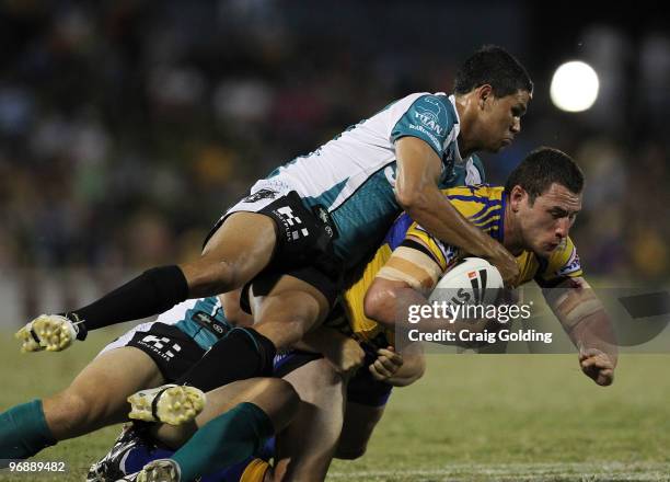 Ben Smith of the Eels is tackled during the NRL trial match between the Penrith Panthers and the Parramatta Eels at CUA Stadium on February 20, 2010...