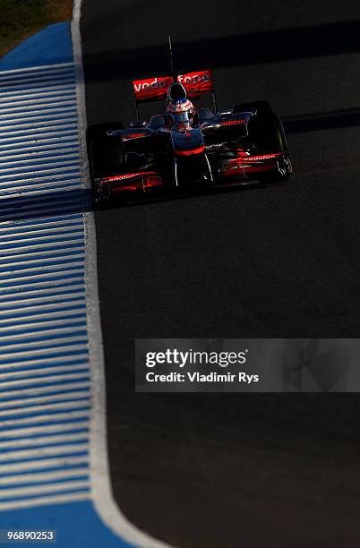 Jenson Button of Great Britain and McLaren Mercedes drives during winter testing at the Circuito De Jerez on February 19, 2010 in Jerez de la...