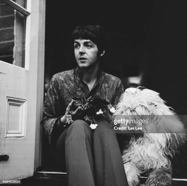 English singer-songwriter and musician Paul McCartney with his dog, English Sheepdog Martha, and two kittens at his house in St John's Wood, London,...