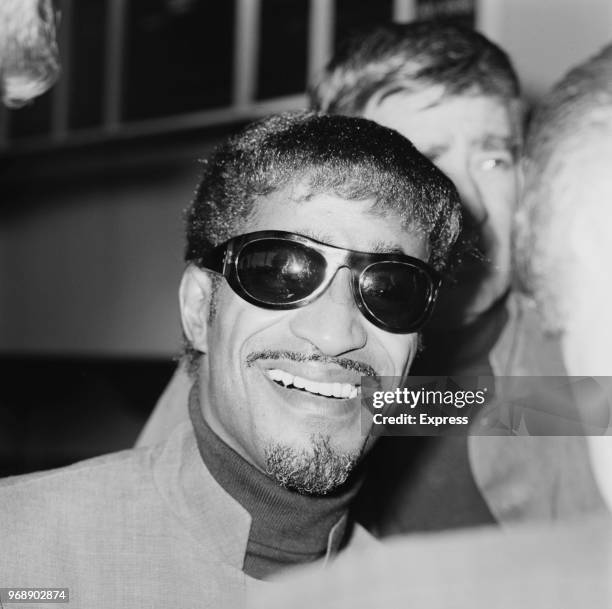 American singer, dancer, actor and comedian Sammy Davis Jr at Heathrow Airport, London, UK, 22nd June 1967.