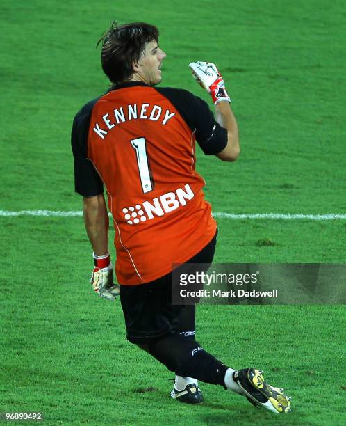 Jets keeper Ben Kennedy pumps his fist after making the save to win the A-League semi final match between Gold Coast United and the Newcastle Jets at...