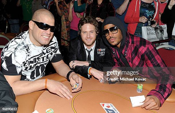 Former UFC Champion Tito Ortiz, actor A.J. Buckley, and actor Marlon Wayans participate in Pokerstars.net's Celebrity Charity Poker Tournament at...