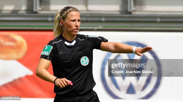 Referee Ines Appelmann gestures during the Allianz Frauen Bundesliga match between VfL Wolfsburg and 1. FC Koeln at AOK-Stadion on June 3, 2018 in...