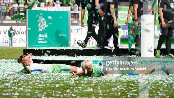 Alexandra Popp and Nilla Fischer of Wolfsburg celebrate the champion chip after the Allianz Frauen Bundesliga match between VfL Wolfsburg and 1. FC...