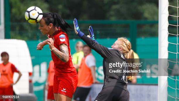 Peggy Nietgen and Claudia Hoffmann of Koeln fight for the ball during the Allianz Frauen Bundesliga match between VfL Wolfsburg and 1. FC Koeln at...