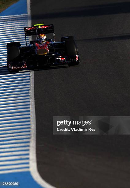 Jaime Alguersuari of Spain and Scuderia Toro Rosso drives during winter testing at the Circuito De Jerez on February 19, 2010 in Jerez de la...