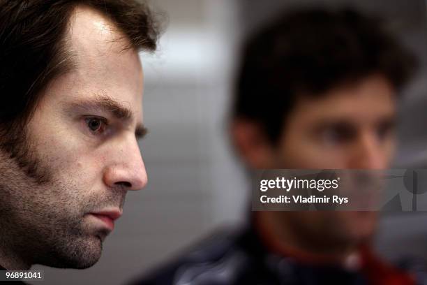 Race engineer Ciaron Pilbeam and Mark Webber of Australia and Red Bull Racing are pictured in the garage during winter testing at the Circuito De...