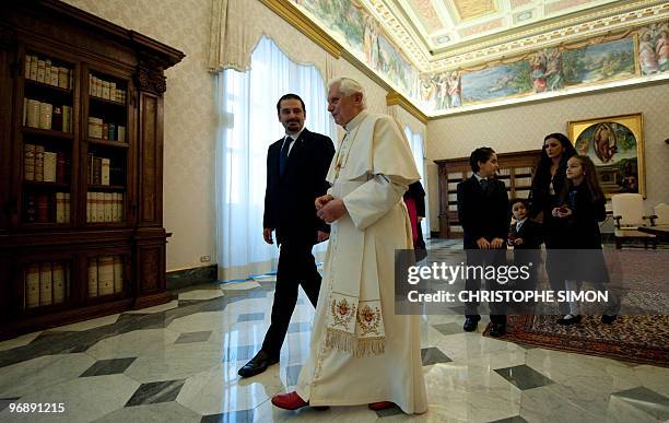 Pope Benedict XVI walks with Lebanese Prime Minister Saad Hariri , followed by his wife Lara Azm and children, Hussam , Rafik Jr. And daughter Lulwa,...