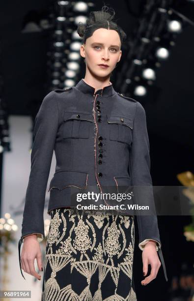 Model walks down the catwalk at the Kinder Aggugini show during London Fashion Week on February 20, 2010 in London, England.