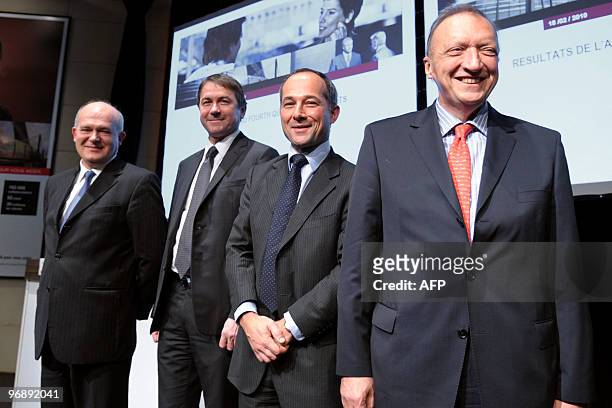Societe Generale chairman Frederic Oudea poses along with Deputy Chief Executive Officer Severin Cabannes, Deputy Chief Executive Officer Bernardo...