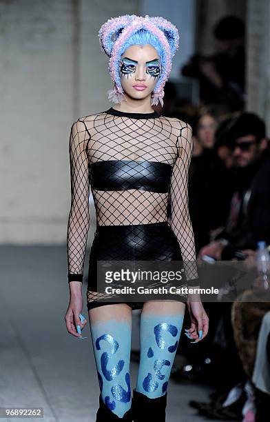 Model walks down the catwalk during the Fashion East fashion show during London Fashion Week at the BFC Show Space at Somerset House on February 20,...