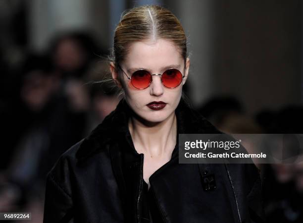 Model walks down the catwalk during the Fashion East fashion show during London Fashion Week at the BFC Show Space at Somerset House on February 20,...