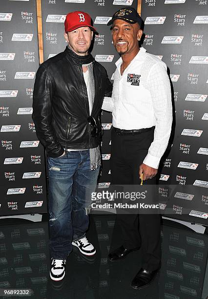 Actor/singer Donnie Wahlberg and TV personality Montel Williams arrive at Pokerstars.net's Celebrity Charity Poker Tournament at Venetian Hotel and...