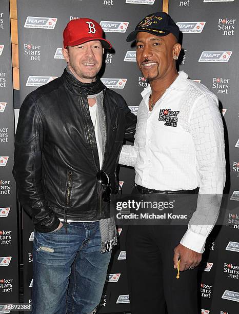 Actor/singer Donnie Wahlberg and TV personality Montel Williams arrive at Pokerstars.net's Celebrity Charity Poker Tournament at Venetian Hotel and...