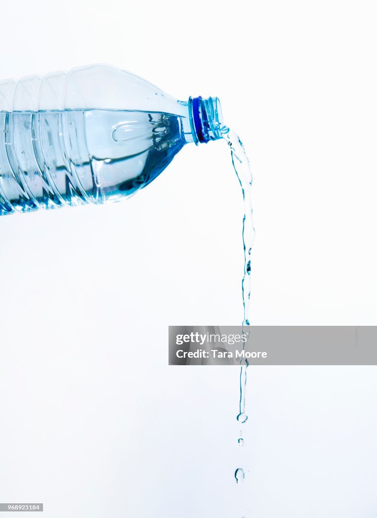 Plastic bottle pouring water