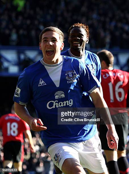 Dan Gosling of Everton celebrates scoring his teams second goal with Louis Saha during the Barclays Premier League match between Everton and...