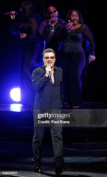 Singer George Michael performs on stage in concert on the first night of his "George Michael Live" Australian tour at Burswood Dome on February 20,...