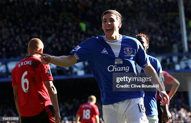 Dan Gosling of Everton celebrates scoring his teams second goal during the Barclays Premier League match between Everton and Manchester United at...