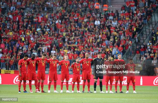 Belgian players respect a minute of silence during a friendly game between Belgium and Portugal, as part of preparations for the 2018 FIFA World Cup...
