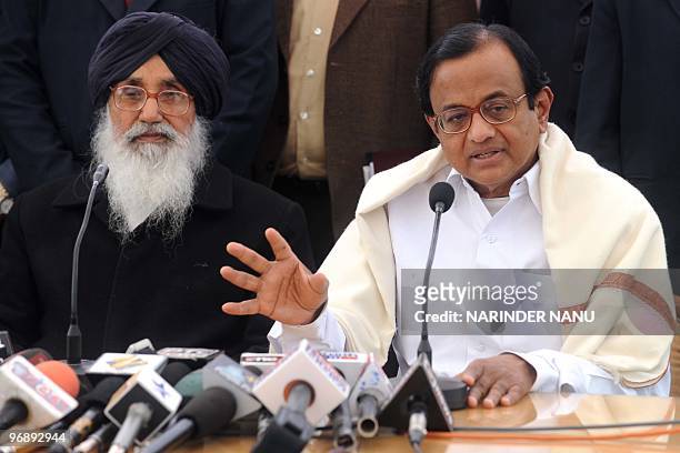 Indian Home Minister P Chidambaram along with Punjab state Chief Minister Parkash Singh Badal address journalists following the inauguration of...