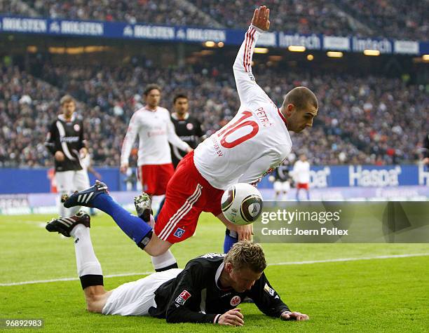 Mladen Petric of Hamburg and Maik Franz of Frankfurt battle for the ball during the Bundesliga match between Hamburger SV and Eintracht Frankfurt at...