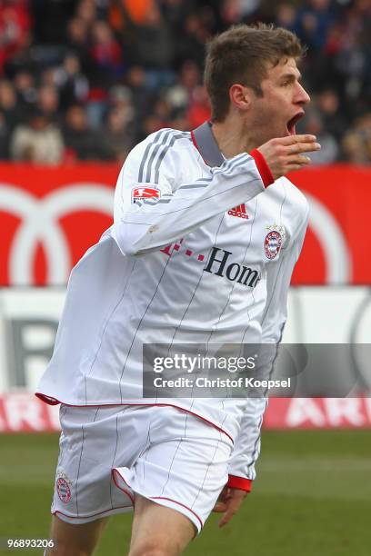 Thomas Mueller of Bayern celebrates scoring his team's first goal during the Bundesliga match between 1. FC Nuernberg and FC Bayern Muenchen at Easy...