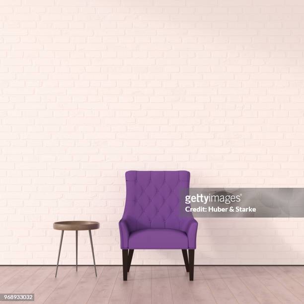 purple armchair with coffee table - lounge chair foto e immagini stock