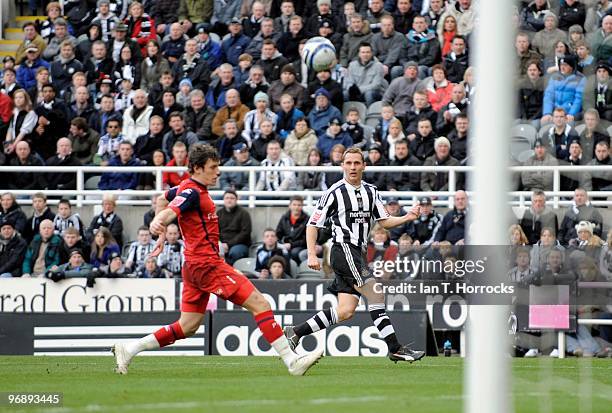 Peter Lovenkrands strikes a cross/shot for the opening goal during the Coca-Cola championship match between Newcastle United and Preston North End at...