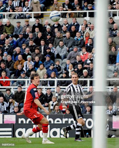 Peter Lovenkrands strikes a cross/shot for the opening goal during the Coca-Cola championship match between Newcastle United and Preston North End at...