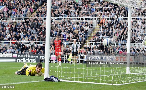 Preston Keeper Andy Lonergan tries to keep out a Peter Lovenkrands a cross/shot for the opening goal during the Coca-Cola championship match between...