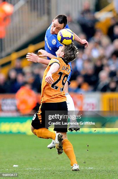 Kevin Doyle of Wolverhampton and John Terry of Chelsea battle for the ball during the Barclays Premier League match between Wolverhampton Wanderers...