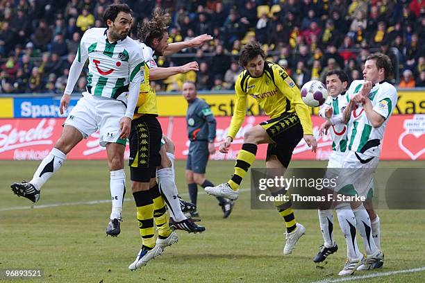 Neven Subotic of Dortmund scores the first goal during the Bundesliga match between Borussia Dortmund and Hannover 96 at Signal Iduna Park on...