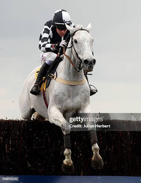 Barry Geraghty and Monets Garden clear the last fence before winning The Betfair Ascot Steeple chase Race run at Ascot Racecourse on February 20,...