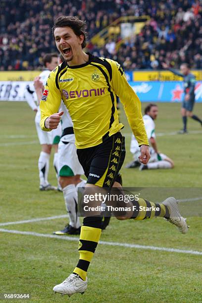 Neven Subotic of Dortmund celebrates scoring his teams first goal during the Bundesliga match between Borussia Dortmund and Hannover 96 at Signal...