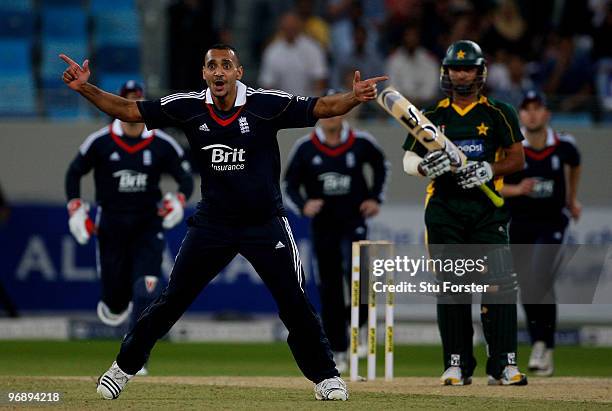 England bowler Ajmal Shahzad celebrates after taking the wicket of Imran Farhat, his second wicket in his first over in International cricket during...
