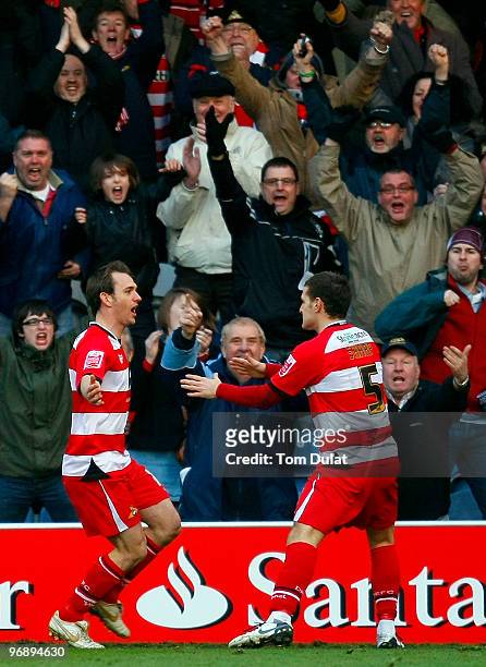 James Hayter together with Billy Sharp of Doncaster Rovers celebrates scoring his sides first goal during the Coca-Cola Championship match between...
