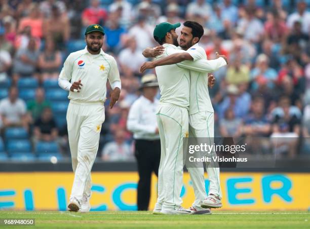 Pakistan bowler Hassan Ali is congratulated by team mates after claiming Alastair Cook"u2019s wicket during day one of the 2nd NatWest Test match...