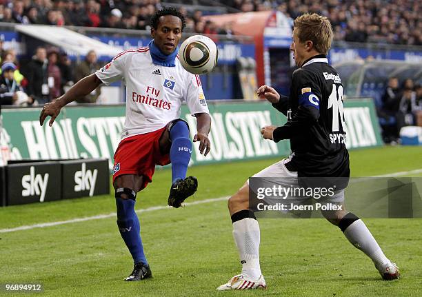 Ze Roberto of Hamburg and Christoph Spycher of Frankfurt battle for the ball during the Bundesliga match between Hamburger SV and Eintracht Frankfurt...