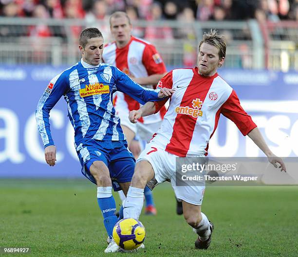 Eugen Polanski of Mainz battles for the ball with Stanislav Sestak of Bochum during the Bundesliga match between FSV Mainz 05 and VFL Bochum at...